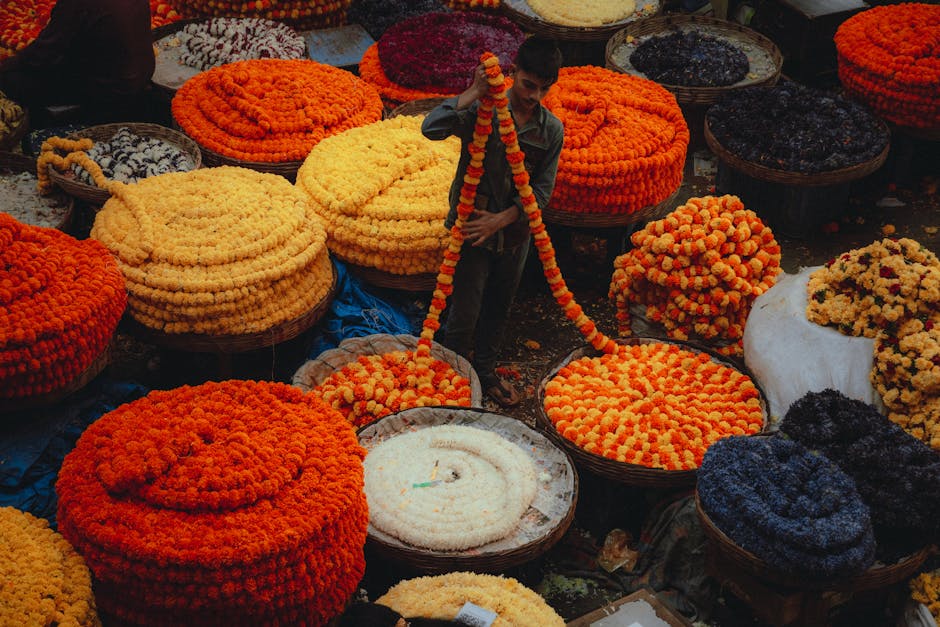 Vibrant flower market in Bengaluru showcasing marigold garlands and local culture.
