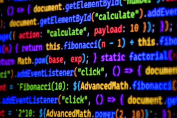 Bright and colorful JavaScript code displayed on a computer screen, showcasing programming.