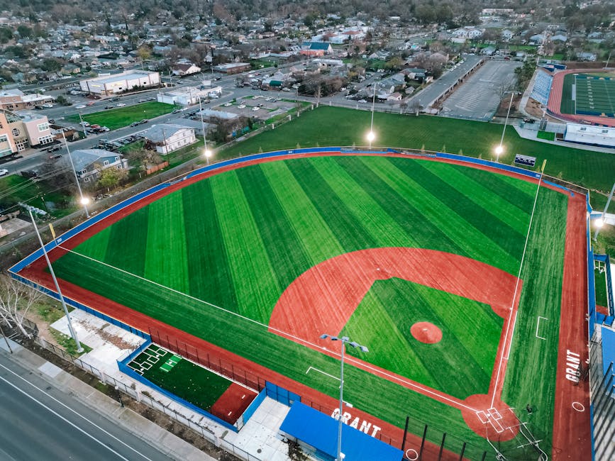 Aerial shot of a well-maintained baseball field in Grant neighborhood, Sacramento, during the day.