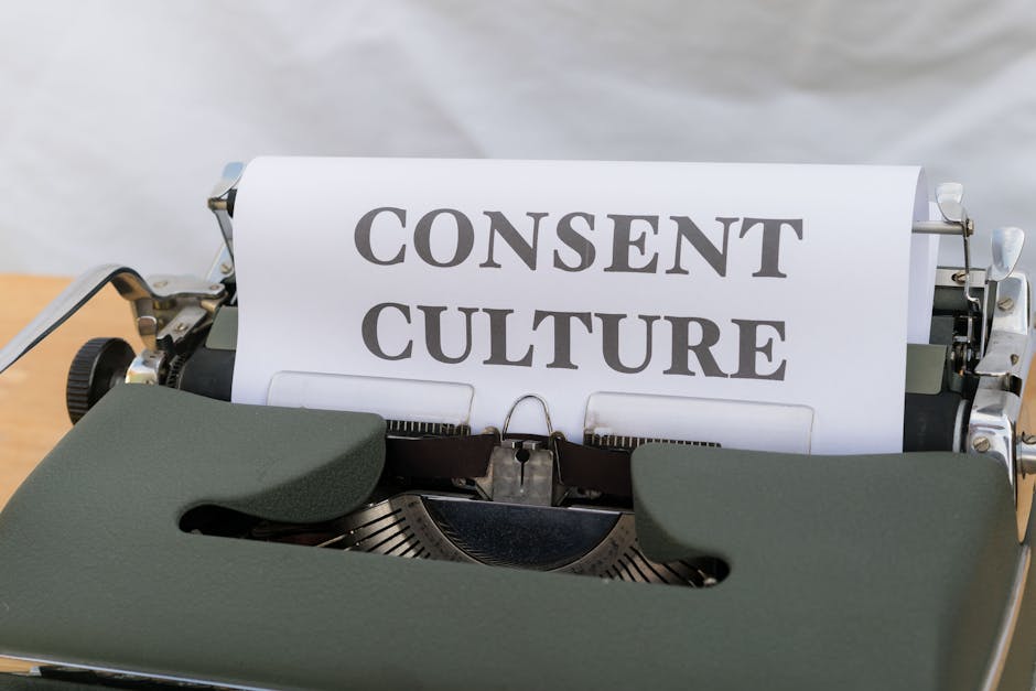 Close-up of the words 'Consent Culture' typed on paper in a vintage typewriter.