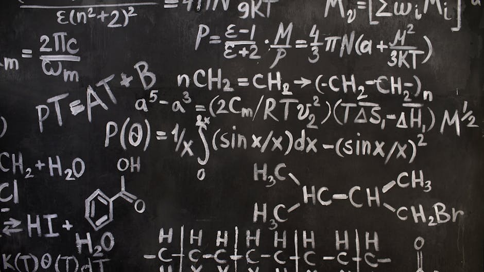 A close-up view of complex mathematical and chemical formulas on a blackboard.