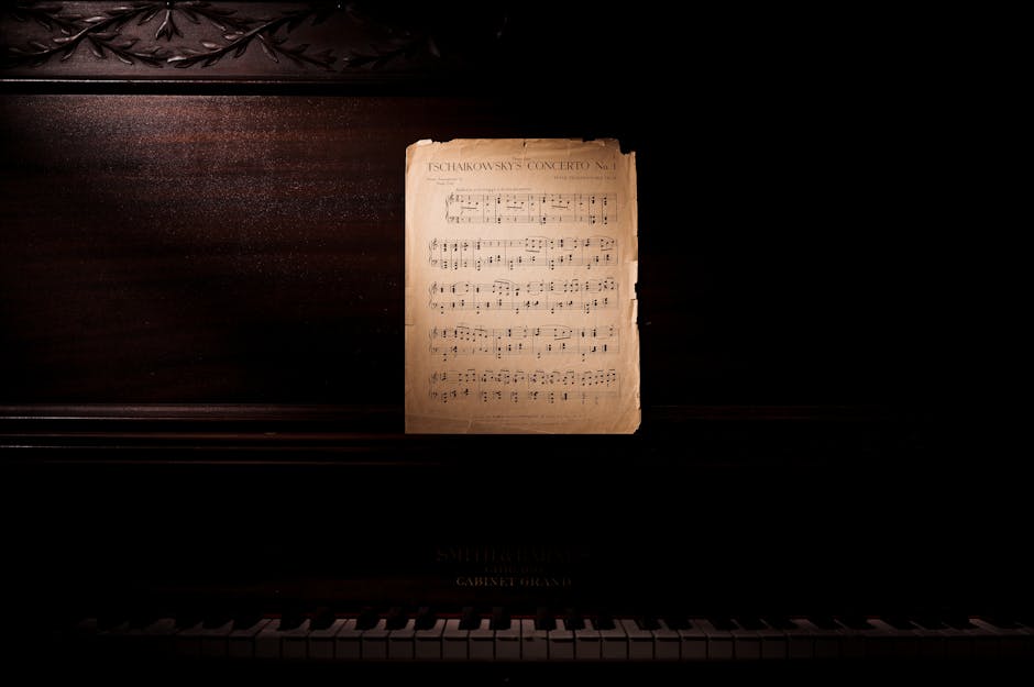 A classic piano with Tchaikovsky's concerto sheet music, evoking a nostalgic, musical ambiance.