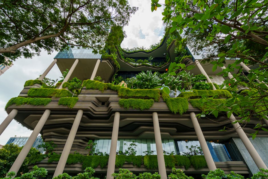 Lush green facades and innovative design on a Singapore building showcasing sustainable architecture.