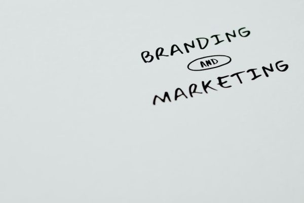 A minimalist image featuring the words 'Branding' and 'Marketing' on a white background, ideal for digital marketing themes.