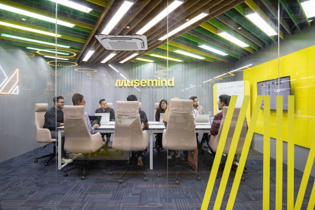 a group of people sitting around a table