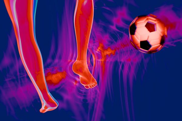 Abstract image of legs kicking a colorful soccer ball with dynamic energy.