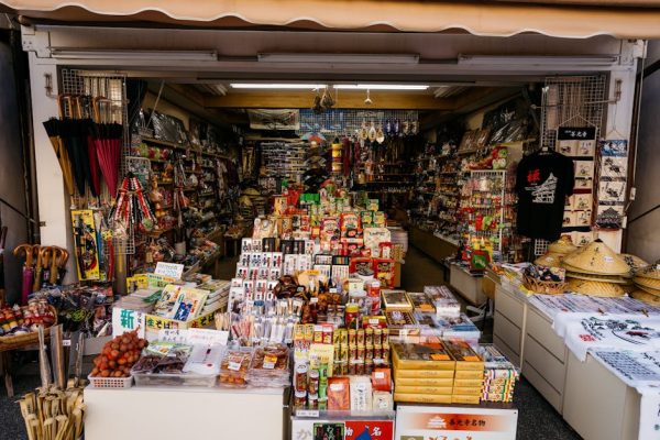 Vibrant market stall with diverse products in Nagano, Japan, showcasing traditional Japanese items.