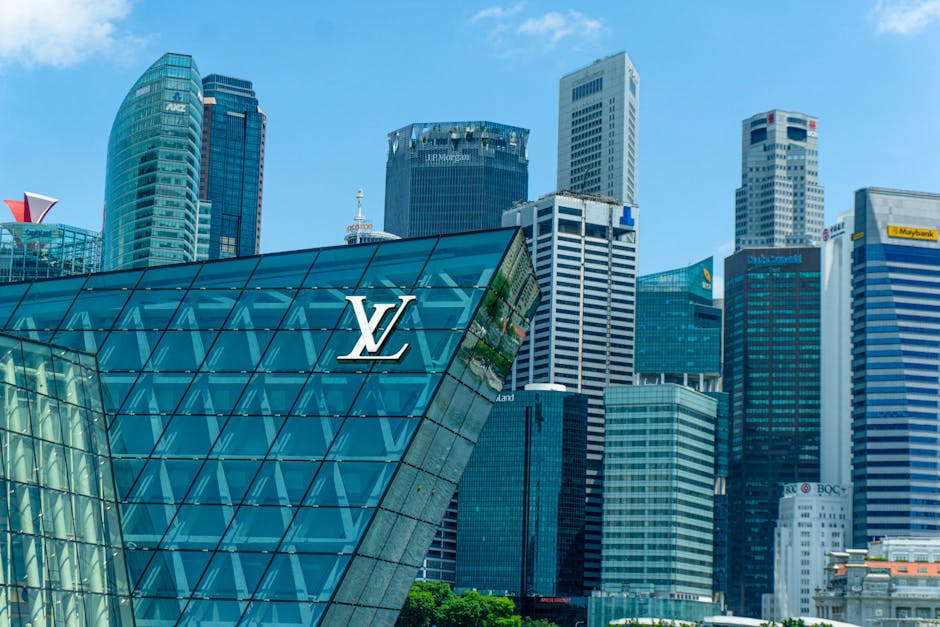 A stunning view of Singapore's skyline featuring iconic modern skyscrapers and the LV storefront.