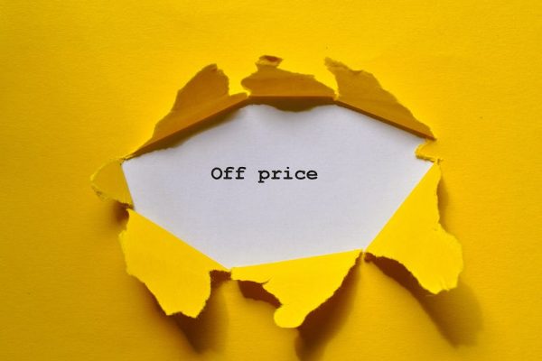 Yellow torn paper revealing 'Off price' for sale and discount promos.