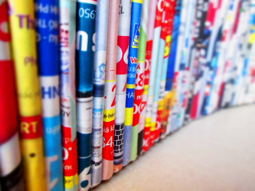 Vibrant, assorted rolled magazines create a colorful display.