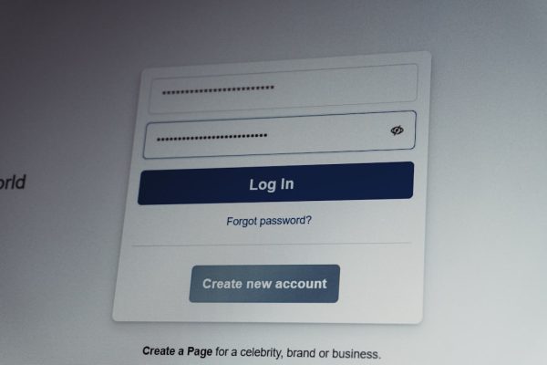 Facebook login screen with username and password fields.